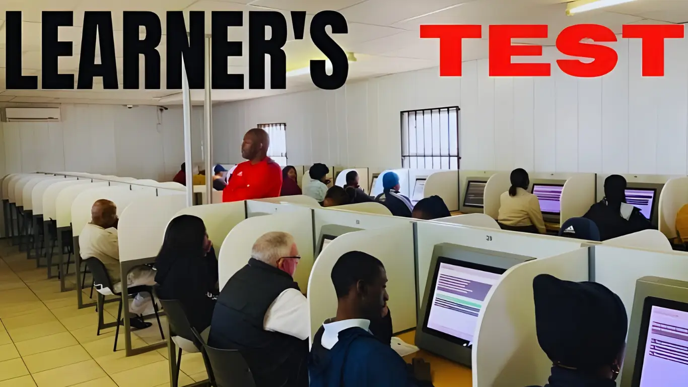 Group of young adults seated at desks writing the K53 learner’s licence test in a Durban traffic department